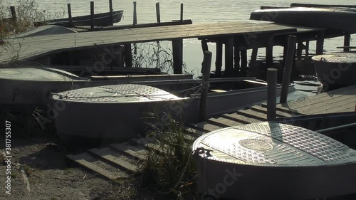 Fishing boats on the pier, Lake Ladoga, Russia. photo