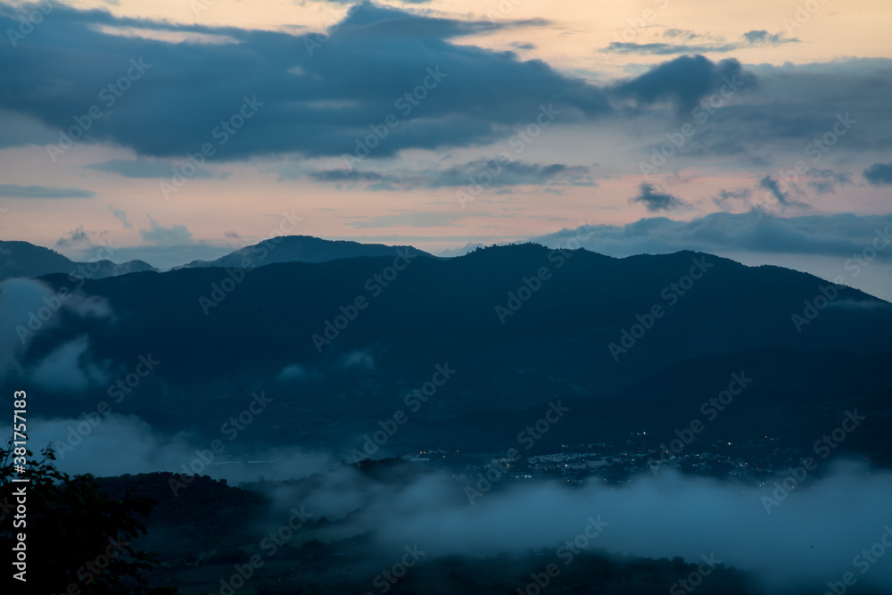 dramatic image of mountain landscape in the caribbean town of Ocoa, Dominican Republic. during sunset, cloudy skies.