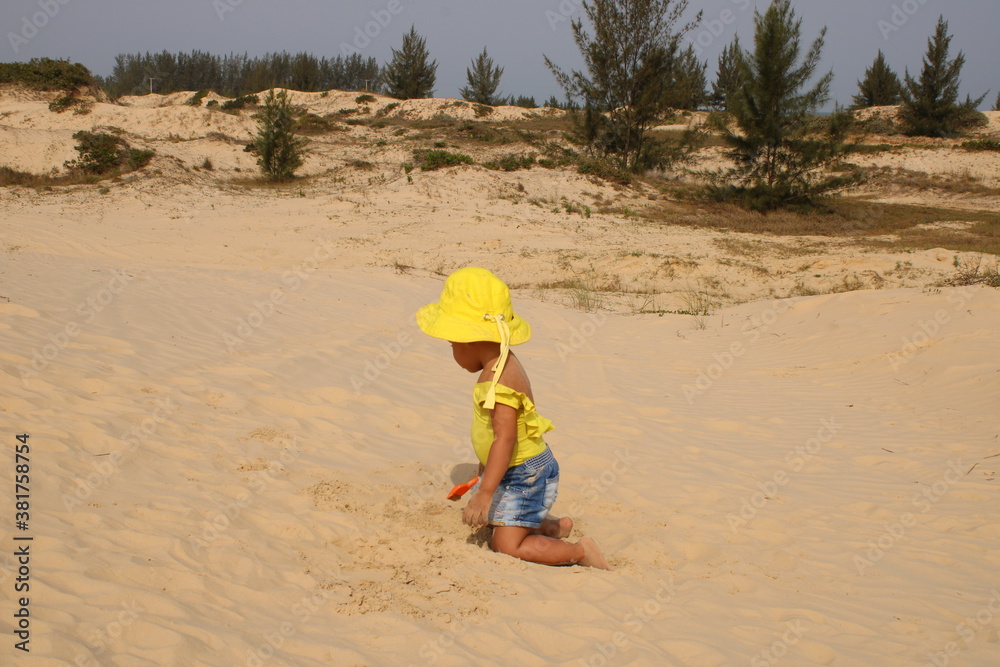 child playing on the beach child playing on the beach