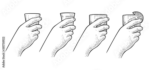 Female hand holding a glass with tequila, rum, gin, whiskey. Engraving