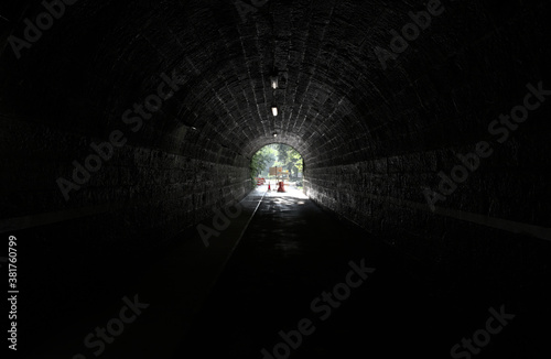 dark tunnel with light at the end photo