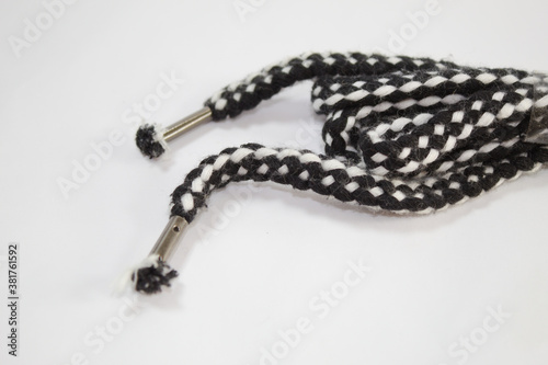 Cord to tie shoe with white background