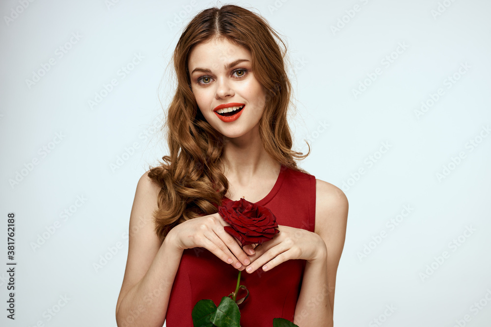 Pretty woman with rose in her hands charm gift lifestyle studio light background Pretty woman with rose in her hands charm gift lifestyle studio light background