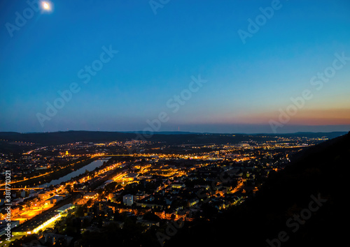 Night shot of the illuminated old German city of Trier, photographed from a hill