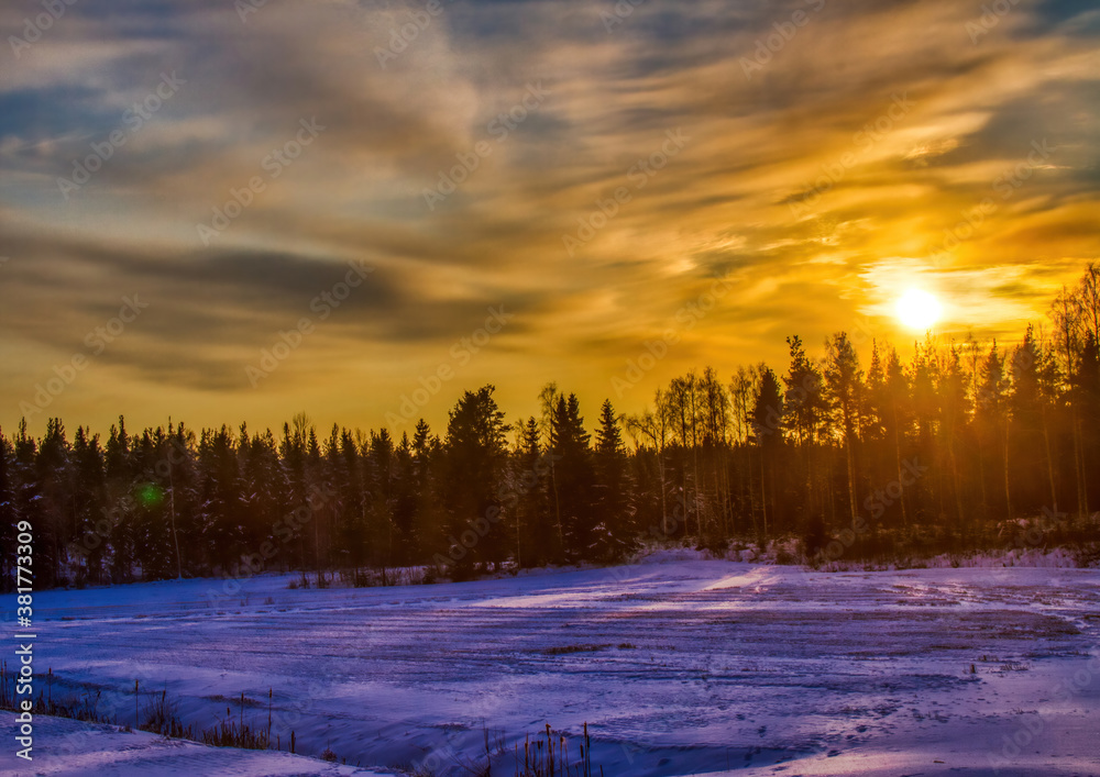 Pictures of a sunset over a forest near the Finnish town of Rauma