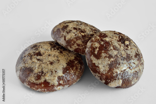 Three delicious chocolate gingerbread on a white background