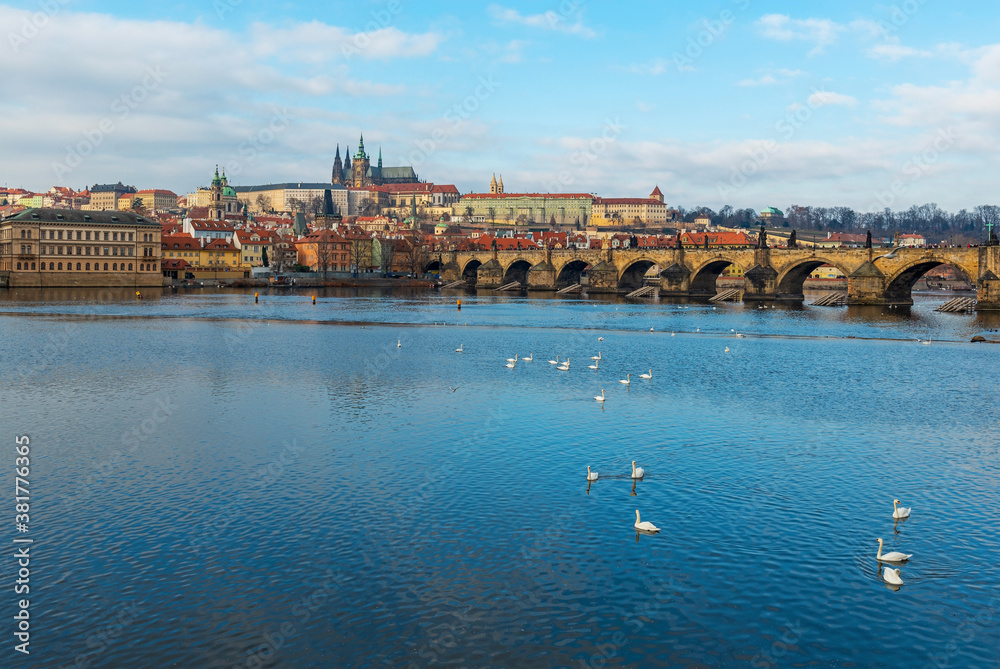 Cityscape of Prague with the Vltava river, the Charles bridge and the Prague Castle, Czech Republic.