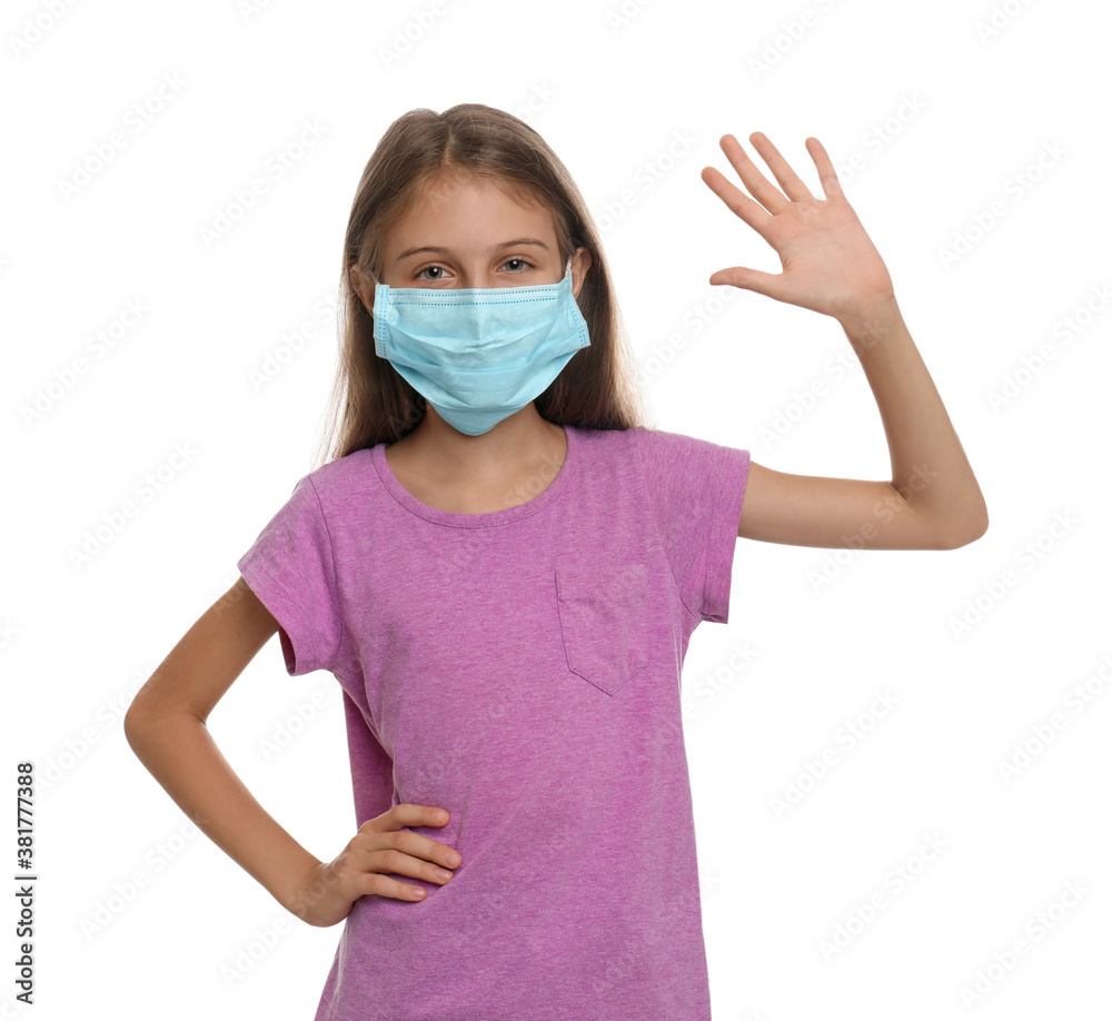 Little girl in protective mask showing hello gesture on white background. Keeping social distance during coronavirus pandemic Little girl in protective mask showing hello gesture on white background. Keeping social distance during coronavirus pandemic