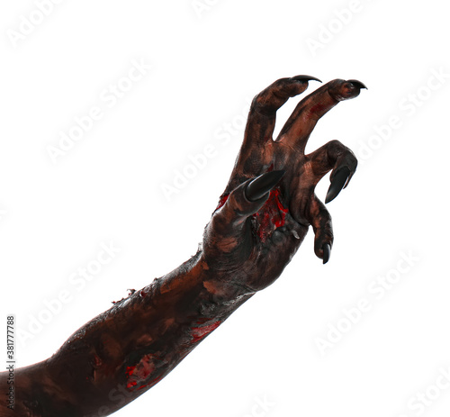 Scary monster on white background  closeup of hand. Halloween character