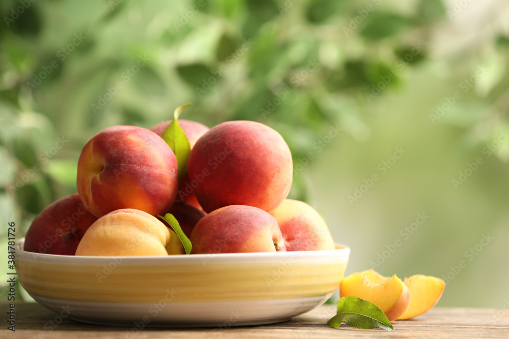 Fresh sweet peaches on wooden table outdoors Fresh sweet peaches on wooden table outdoors