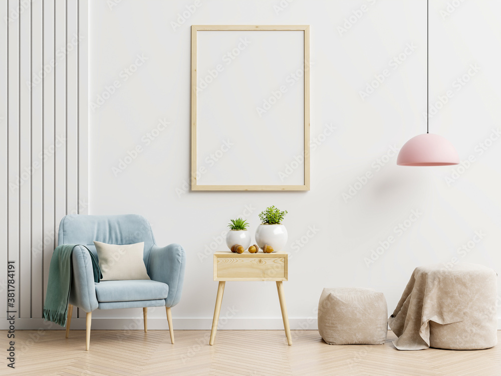 Fototapeta Poster mockup with vertical frames on empty white wall in living room interior with blue velvet armchair.