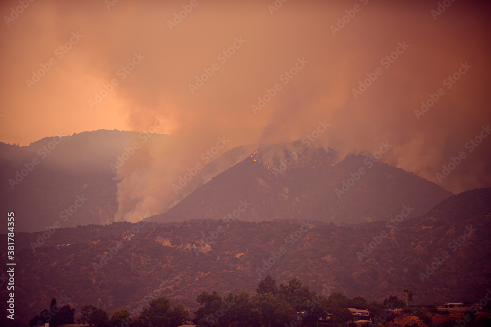 Fires and air pollution. Smoke and fire in the mountains of California. Climate change.