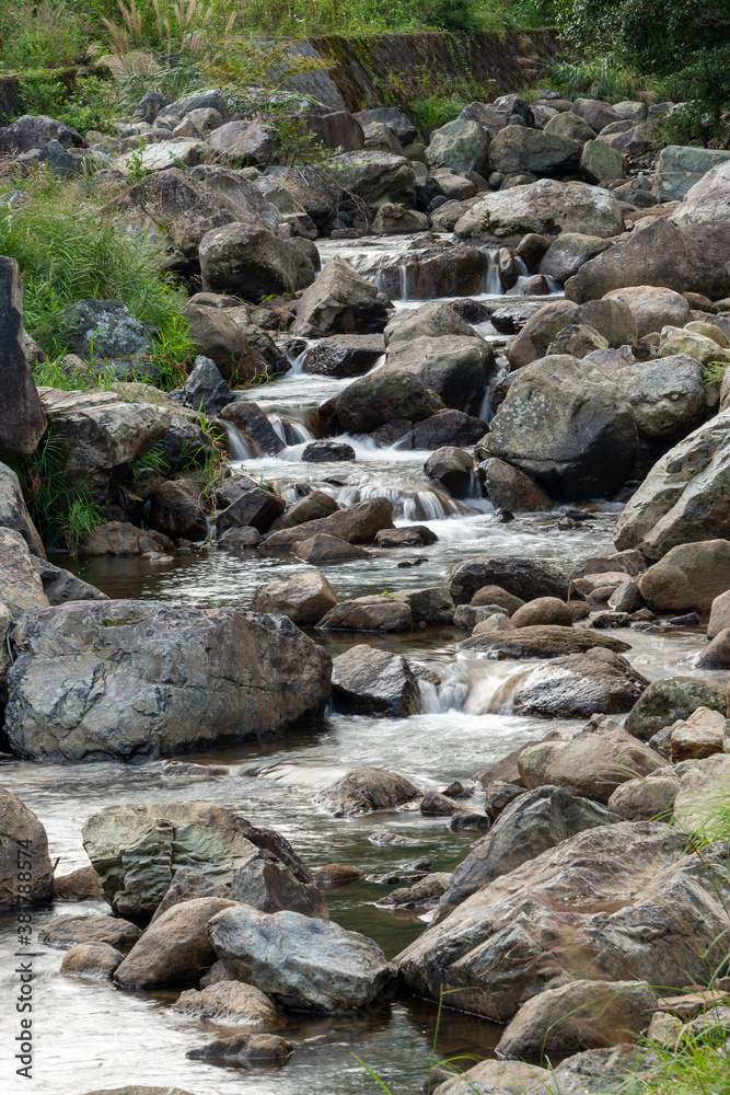 Water flow in Ruri valley in Sonobe, Nantan city, Kyoto, Japan in summer Water flow in Ruri valley in Sonobe, Nantan city, Kyoto, Japan in summer