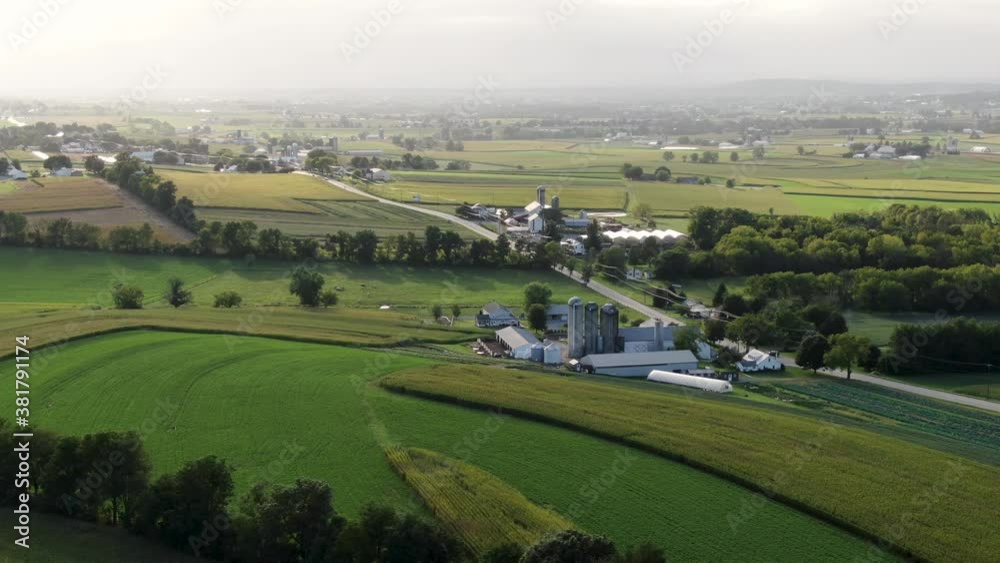 Beautiful aerial shot of rolling hills and farmland in Narvon, Lancaster County Pennsylvania, USA during summer. Green fields and crops. Beautiful aerial shot of rolling hills and farmland in Narvon, Lancaster County Pennsylvania, USA during summer. Green fields and crops.