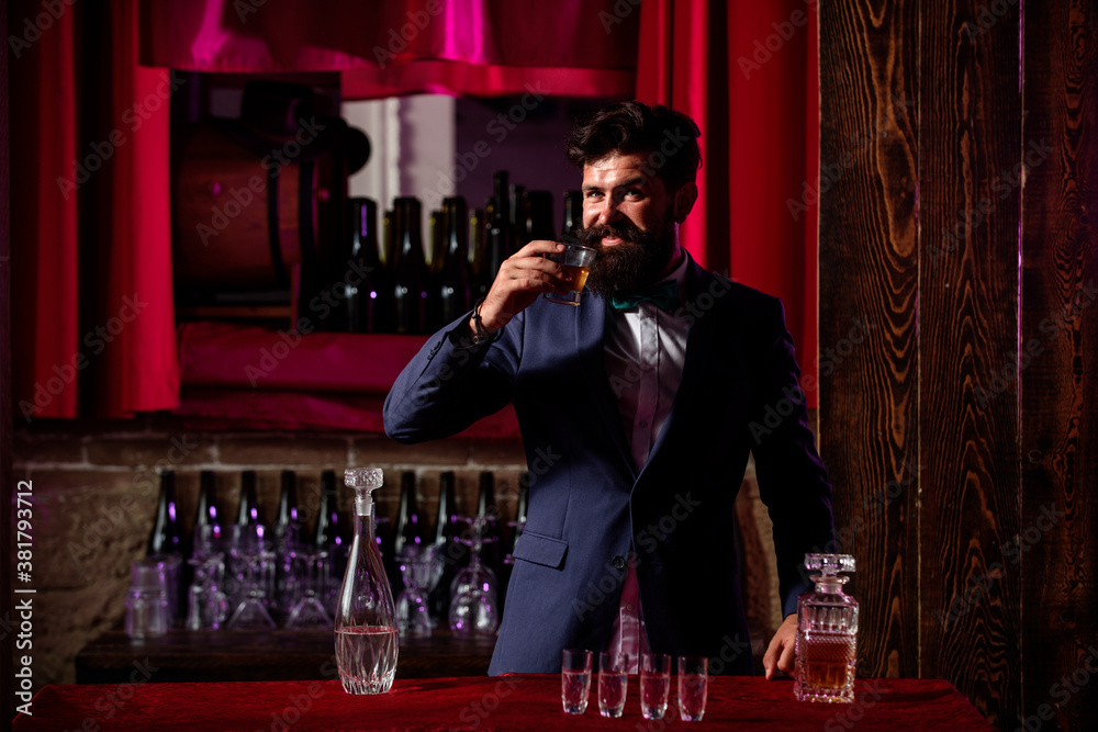 Bartender preparing cocktail. Macho drinking. Stylish rich man holding a glass of old whisky. Gentleman drink cognac or whiskey. Bartender preparing cocktail. Macho drinking. Stylish rich man holding a glass of old whisky. Gentleman drink cognac or whiskey.