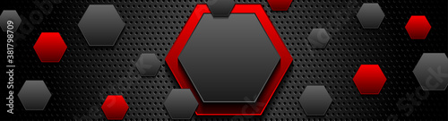 Trendy composition of red and black hexagons on black background. Dark metallic perforated texture design. Technology geometric illustration. Vector header banner