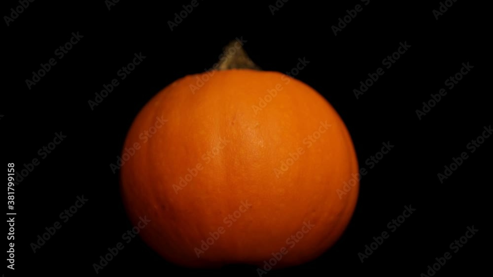 Carved Pumpkin Saying BOO Rotating Slowly on Black BG, Motion Control, Halloween Carved Pumpkin Saying BOO Rotating Slowly on Black BG, Motion Control, Halloween