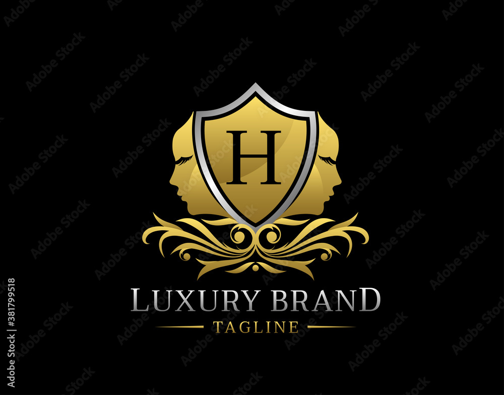 Royal Beauty Logo With H Letter. Elegant Gold Shield badge With Beauty Face Shape perfect for salon, spa, cosmetic, Boutique, Jewelry.