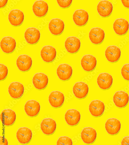 Seamless pattern with pumpkin. Autumn abstract seamless pattern made from Pumpkins on the yellow background. Pumpkin quality pattern.