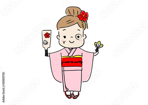 お正月　着物を着て羽子板を遊び　顔に墨を塗られた女の子