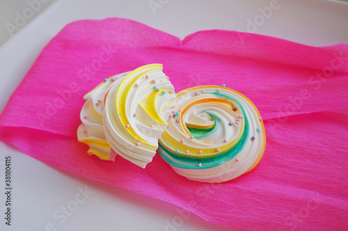 Sweet Colored Meringue on a pink background.  