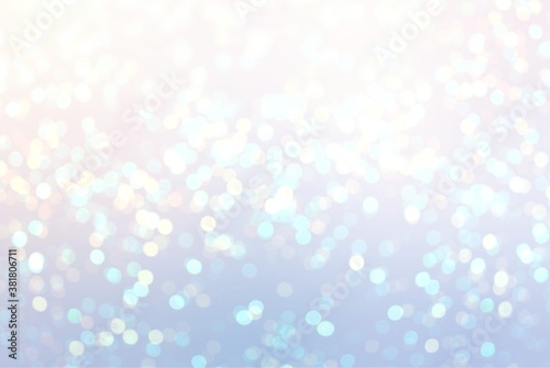 Winter glitter bokeh on pastel background. Light blue brilliance texture. Celebration design.