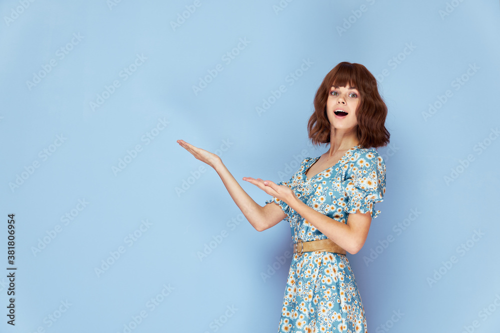 Beautiful woman Holds his hands in front of him with his mouth open Copy Space short hair Beautiful woman Holds his hands in front of him with his mouth open Copy Space short hair
