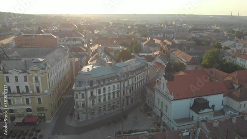 Aerial / drone footage of Pécs, the fifth largest city of Hungary, a major cultural center of Hungary, on the slopes of the Mecsek mountains, administrative and economic center of Baranya County photo