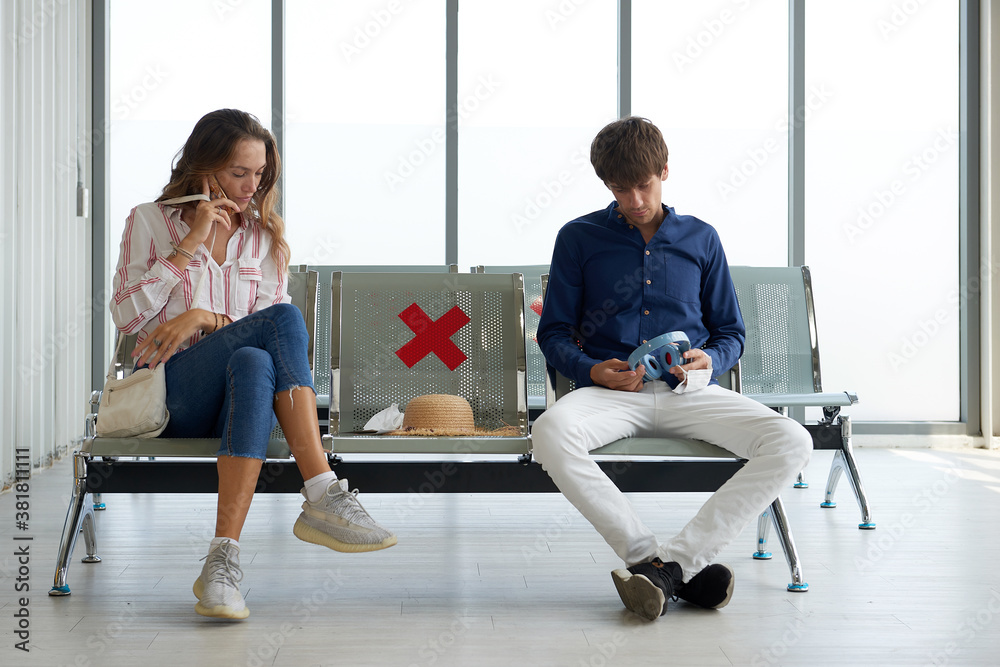 Flight cancelled and delayed due to COVID-19, Unhappy traveller - tourist are boring as waiting for a plane in the airport. Flight cancelled and delayed due to COVID-19, Unhappy traveller - tourist are boring as waiting for a plane in the airport.
