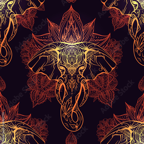 Seamless gold pattern with ethnic elephant head with mehendi decoration and mandala on dark background. Spiritual Ganesha with tribal ornament. Vector texture for fabric, wallpaper and your creativity