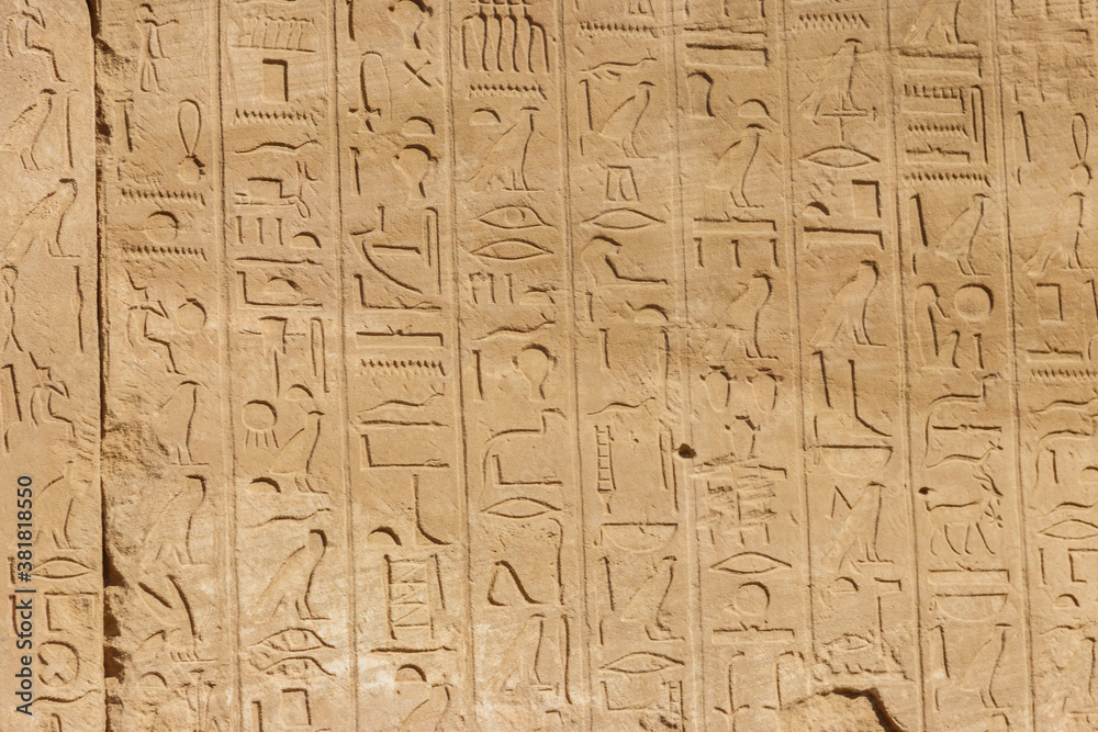 Ancient egyptian hieroglyphs on the wall in Karnak Temple Complex in Luxor, Egypt Ancient egyptian hieroglyphs on the wall in Karnak Temple Complex in Luxor, Egypt