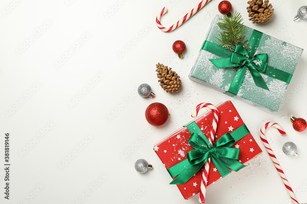 Gift boxes and Christmas accessories on white background