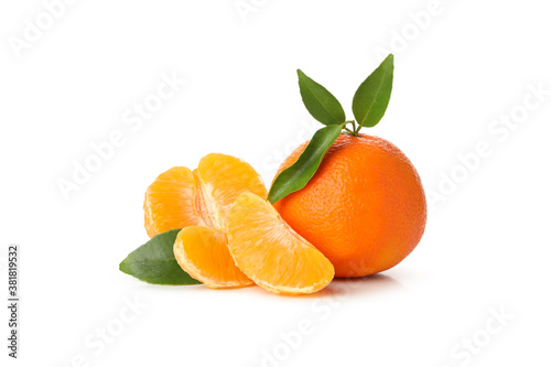 Ripe mandarin with leaves isolated on white background