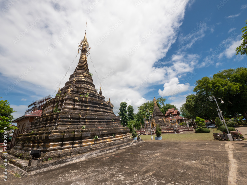 A group of pagodas in Mae Sariang, Mae Hong Son province, Thailand. Burmese style pagodas in Thailand. A group of pagodas in Mae Sariang, Mae Hong Son province, Thailand. Burmese style pagodas in Thailand.