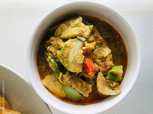 Green curry with pork and shrimp in Thailand.