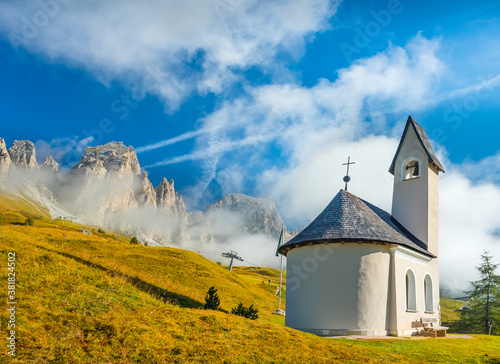 Chapel with mountain view in background, Passo Gardena, Dolomite Mountains, Italy