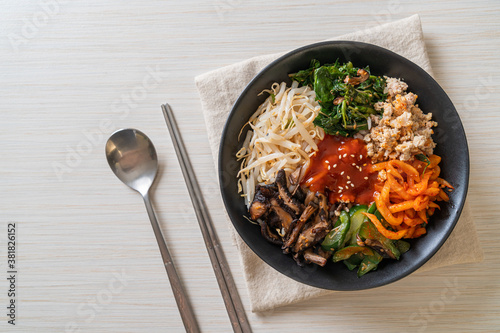 Korean spicy salad with rice - traditionally Korean food, Bibimbap photo