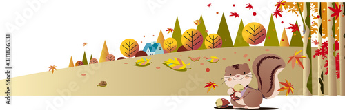 秋の林の中でリスがどんぐりを集める