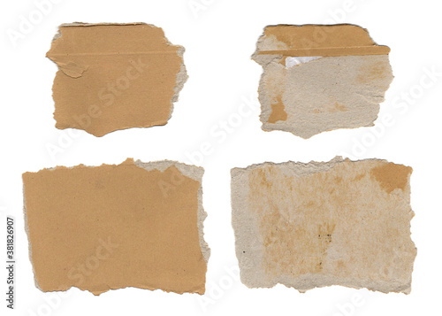 Two pieces of brown cardboard, torn and worn, front and back sides. Useful element or texture. 