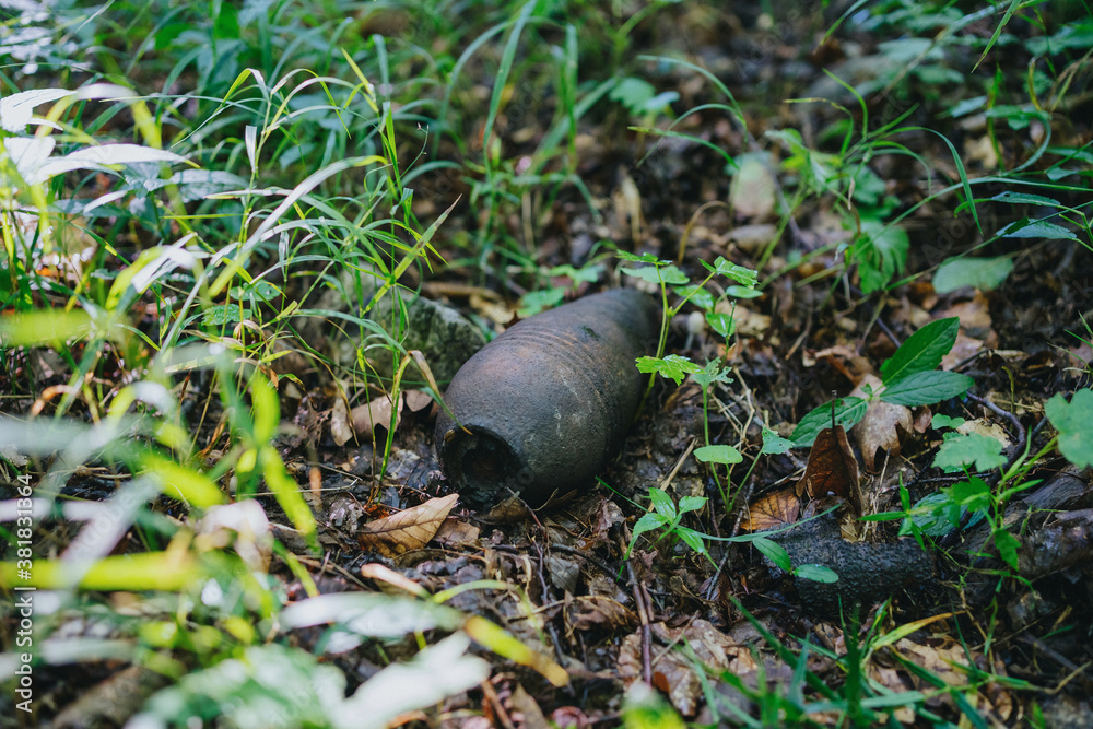 Old mortar projectile left in nature Old mortar projectile left in nature