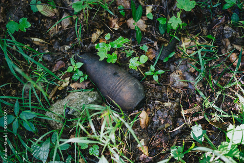 Old mortar projectile left in nature