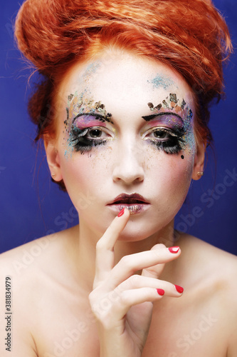 young beautiful woman with colorful bright make-up