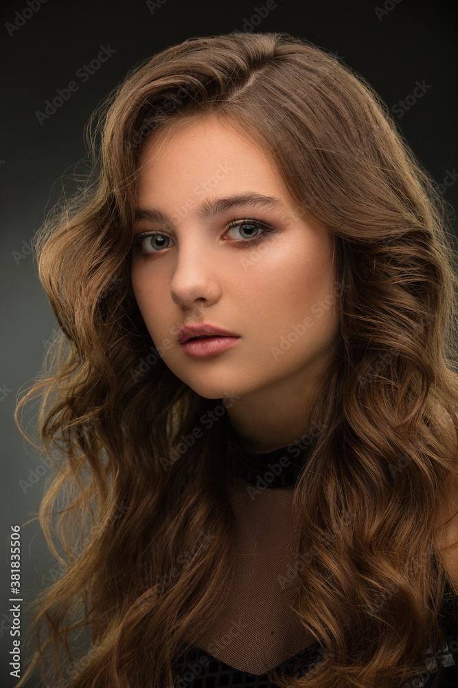 Fototapeta premium portrait of a beautiful girl with a stylish hairstyle