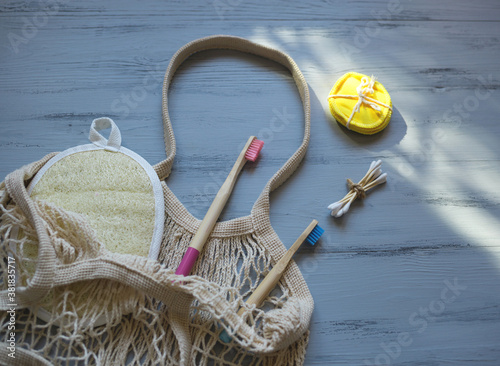 bamboo toothbrushes and sticks, reusable discs, loofah washcloth photo