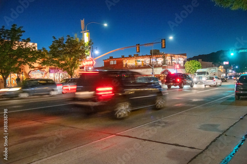 MOAB, UT - JUNE 23, 2018: Street traffic and cars at night © jovannig