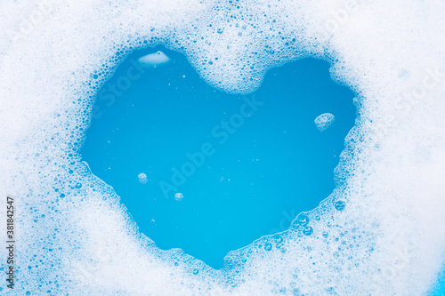 Frame made of detergent foam bubble. heart shape