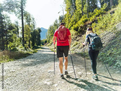 Man and woman tourists on trekking