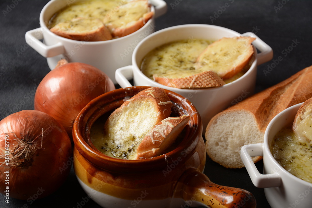 French Onion Soup with toasted bread and cheddar cheese French Onion Soup with toasted bread and cheddar cheese