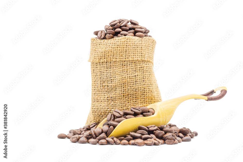 Coffee beans roasted in scoop beans and in sack on white background.