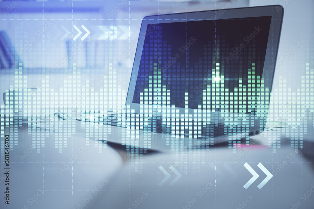 Stock market graph and table with computer background. Double exposure. Concept of financial analysis. Stock market graph and table with computer background. Double exposure. Concept of financial analysis.